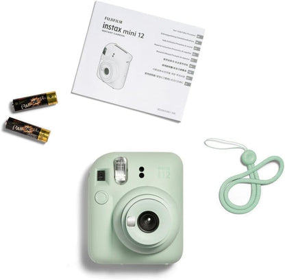 Close-up of Instax Mini 12 sage green lens and focus ring