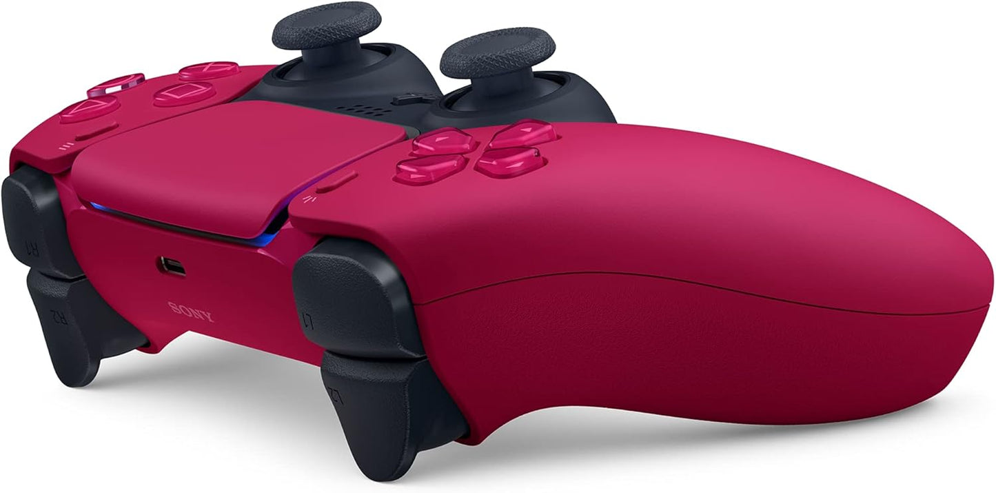 Gamer holding Sony DualSense Cosmic Red PS5 wireless controller