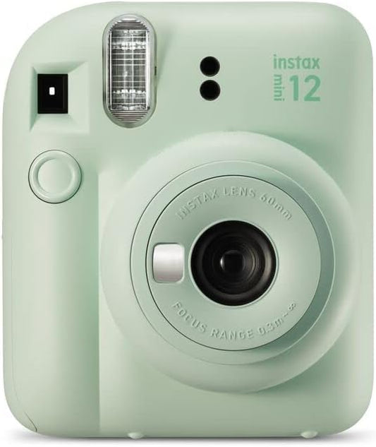 Instax Mini 12 sage green camera front view showing lens and flash