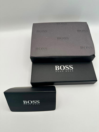 Three black BOSS boxes stacked on a white background